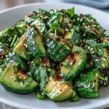 Healthy Smashed Cucumber and Avocado Salad with toasted sesame, a perfect light lunch.