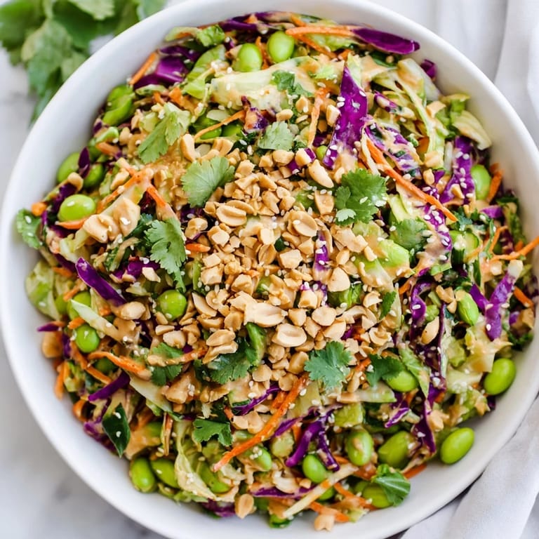 Edamame and red bell pepper add vibrant color to the Crunchy Thai Peanut Salad.